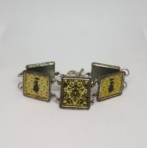 Silvertone charm bracelet with framed pictures